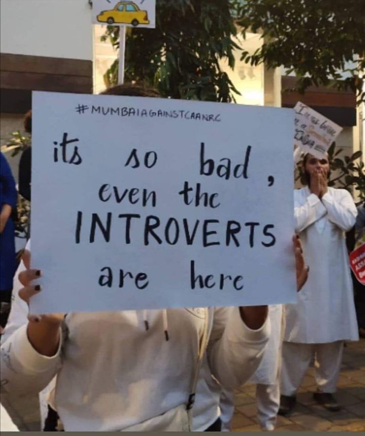 Variations of this sign, saying CYNICS, PRIVILEGED, and TECHIES, instead of INTROVERTS have been seen at protests around the country.