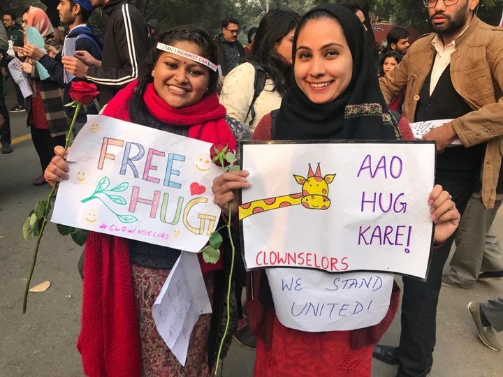 Jannat (R) and Amreen gave out hugs at the protest in Jantar Mantar, New Delhi on Tuesday