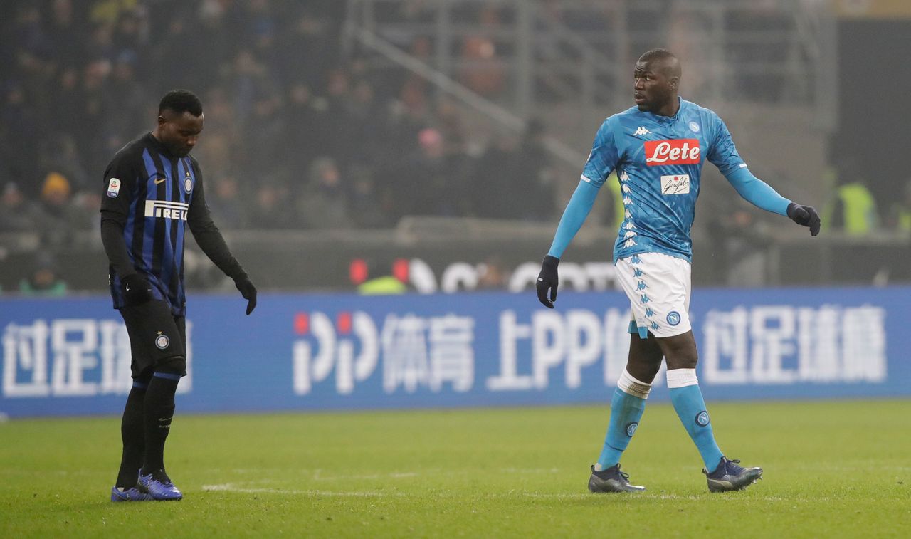 Napoli's Kalidou Koulibaly leaves the pitch after receiving a red card from the referee during a Serie A soccer match between Inter Milan and Napoli, at the San Siro stadium in Milan, Italy. The Napoli defender had been the target of racist chants during the match.