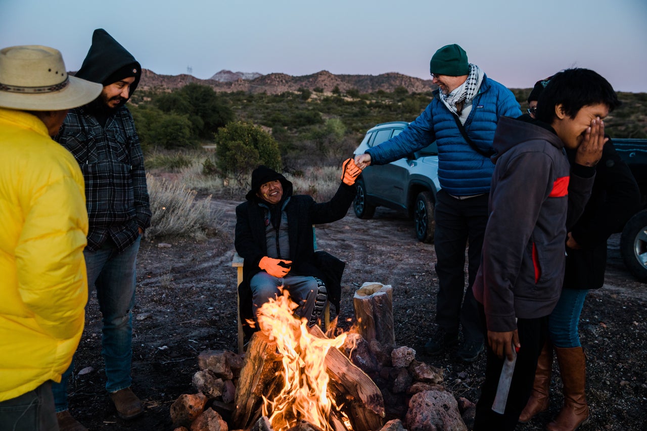 Wendsler Nosie Sr. fist-bumps Steve Pavey on Nov. 30 after the group of family members and supporters reaches Chich’il Bildagoteel (Oak Flat).