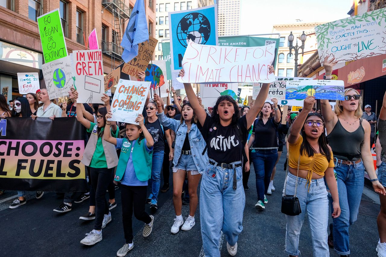 Climate activists participate in a student-led climate change march in Los Angeles on Nov. 1, 2019.
