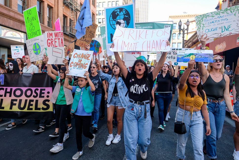 Climate activists participate in a student-led climate change march in Los Angeles in November 2019