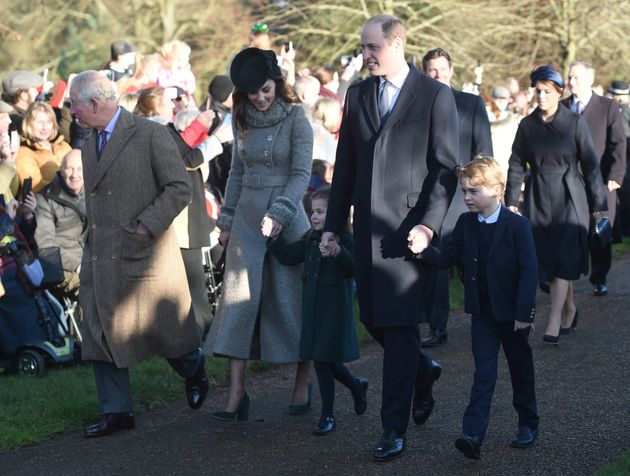 The Prince of Wales with the Duke and Duchess of Cambridge and their children Prince George and Princess Charlotte 