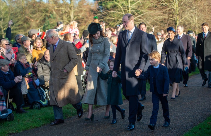 The Prince of Wales, the Duke and Duchess of Cambridge and their children Prince George and Charlotte arriving to attend the Christmas Day morning church service at St Mary Magdalene Church in Sandringham, Norfolk.