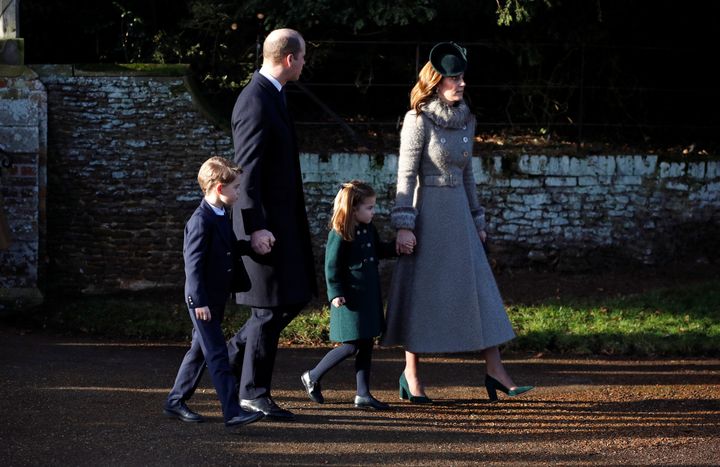Prince William, Catherine, Duchess of Cambridge, Prince George and Princess Charlotte leave the St Mary Magdalene's church on December 25, 2019.