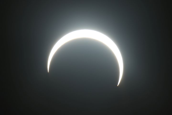 The moon passes between the sun and the earth during the annular solar eclipse in Madinat Zayed in the Al Dhafra region of Abu Dhabi, United Arab Emirates. 