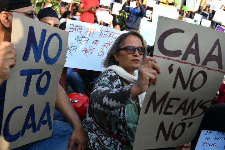 Protesters during a demonstration against the new citizenship law at the Town Hall in Bangalore on December 22, 2019.
