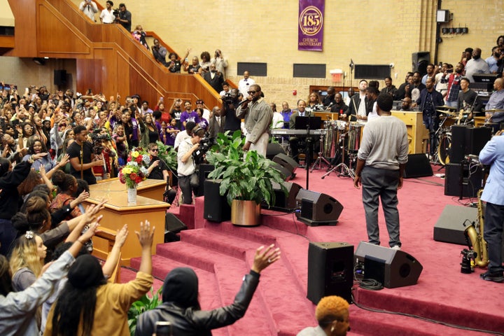 Kanye West (center) speaks during Sunday Service at The Greater Allen A.M.E. Cathedral of New York on Sept. 29, 2019, in New 