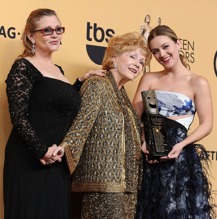 Carrie Fisher, Debbie Reynolds and Billie Lourd pose at the 21st annual Screen Actors Guild Awards on Jan. 25, 2015, in Los Angeles.