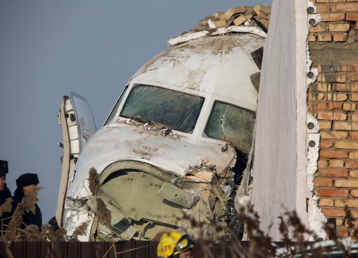 Footage showed the front of the broken-up fuselage rammed a house and the rear of the plane lying in the field next to the airport. 