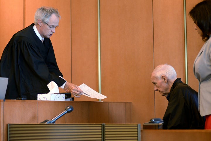 FILE - In this Monday, Aug. 10, 2015 file photo, Judge Timothy Feeley, left, addresses former the Rev. Richard J. McCormick,
