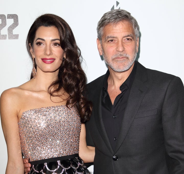 Amal Clooney and George Clooney at the series premiere of "Catch 22" in London.