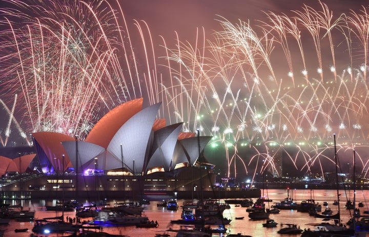 New Year's Eve fireworks erupt over Sydney's iconic Harbour Bridge and Opera House during the fireworks show on January 1, 2019. (Photo by PETER PARKS / AFP) (Photo credit should read PETER PARKS/AFP via Getty Images)