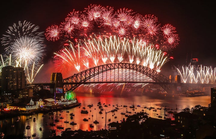 SYDNEY, AUSTRALIA - JANUARY 01: Fireworks explode over the Sydney Harbour Bridge during the midnight display on New Year's Eve on Sydney Harbour on January 1, 2019 in Sydney, Australia. (Photo by Scott Barbour\City of Sydney/Getty Images)