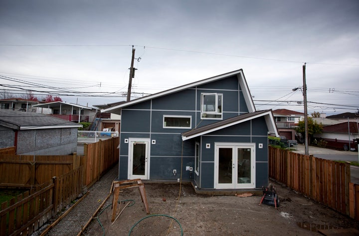 A laneway house under construction on Knight Street in Vancouver, Oct. 29, 2010. The city's rules allowing laneway homes has inspired similar initiatives in Toronto and California.