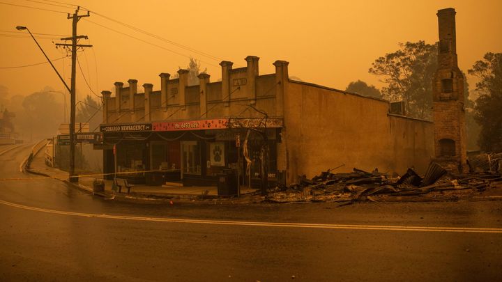 The remains of burnt out buildings are seen along main street in the New South Wales town of Cobargo on Dec. 31, 2019, after bushfires ravaged the town.
