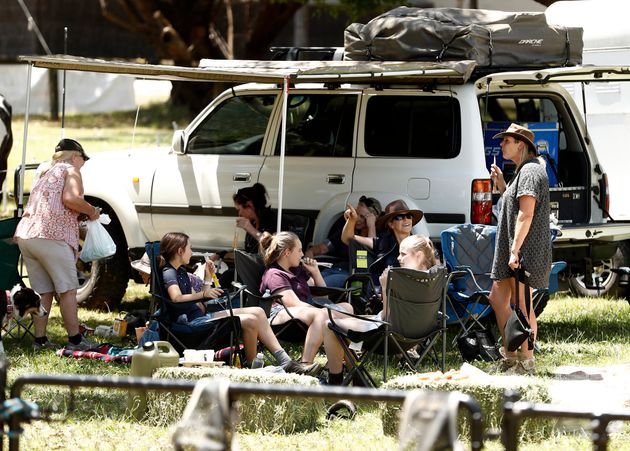 Locals congregate in an evacuation area.