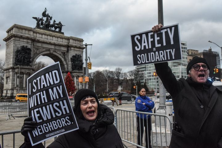 Demonstrators take part in a rally in support of the Jewish community on New Year's Eve in Brooklyn, New York, following recent anti-Semitic attacks.