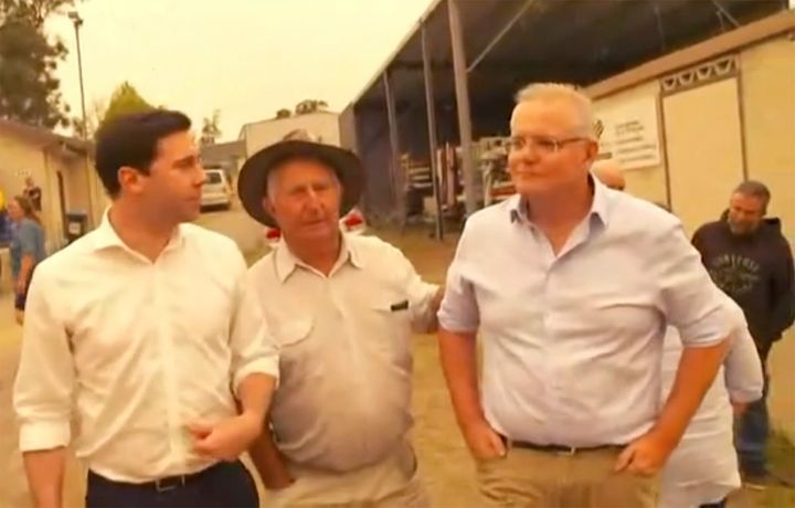 Scott Morrison is confronted by angry residents as he visited a wildfire-ravaged Cobargo, in New South Wales.