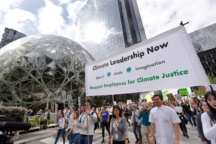 Amazon employees lead a climate strike march from the company's Seattle headquarters on Sept. 20, 2019. Across the globe, hundreds of thousands of people took to the streets to demand concrete action on climate change.