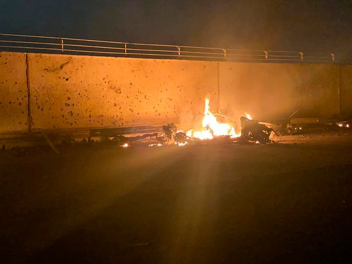 A photo released by the Iraqi prime minister's press office shows a burning vehicle at the Baghdad International Airport following a US airstrike