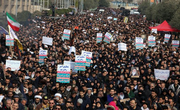 Iranians hold anti-US banners during a demonstration in the capital Tehran 