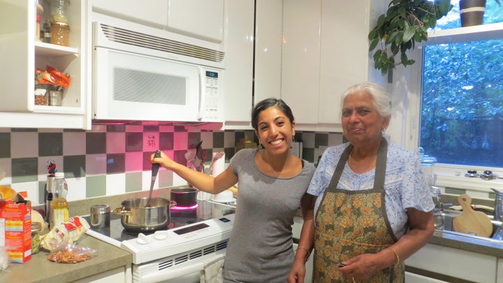 An adult Ishani and her Nani, left, in the kitchen.