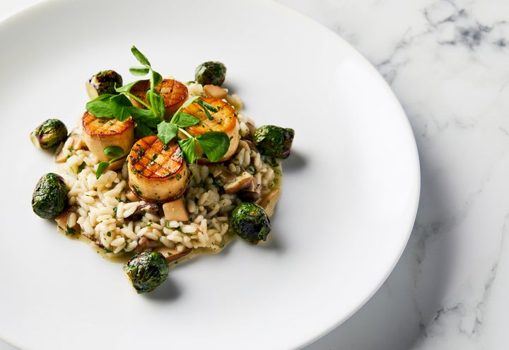 The mushroom scallops and wild mushroom risotto slated to be served as the main course for the all-vegan 77th Golden Globes on Jan. 5.