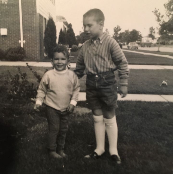 Stern (right) and his brother Lee (left) in front of their childhood home in Livonia, Michigan, in 1968.