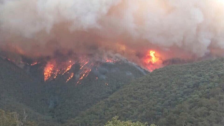 In this image released Thursday, Jan. 2, 2020, from the DELWP Gippland, shows massive smoke rising from wildfires burning in East Gippsland, Victoria.