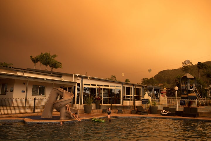 Kids play in the pool at a holiday park on Dec. 21 in Shoalhaven Heads, NSW, Australia. 