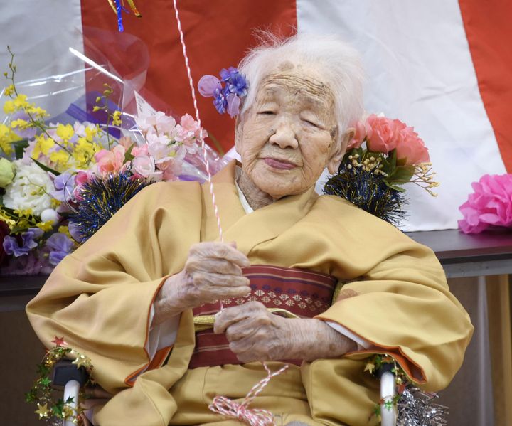 Kane Tanaka, born in 1903, smiles as a nursing home celebrates her 117th birthday in Fukuoka, Japan.