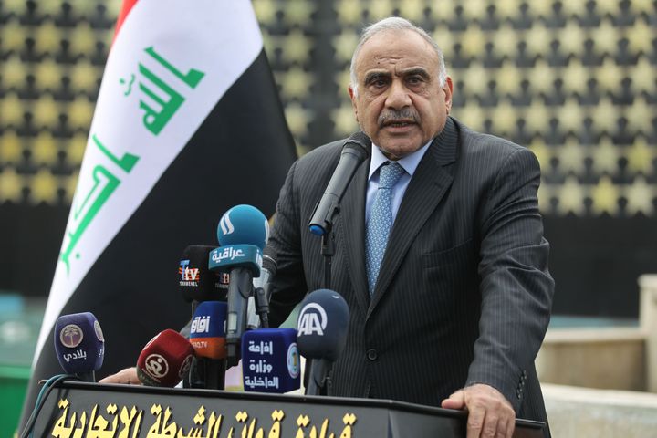 Iraqi Prime Minister Adel Abdul Mahdi speaks during a symbolic funeral ceremony in Baghdad on Oct. 23 for Maj. Gen. Ali al-Lami, a commander of the Iraqi Federal Police's Fourth Division, who was killed the previous day in Samarra in the province of Salahuddin, north of the Iraqi capital. He told parliament Sunday that the Iraqi government should begin scheduling the withdrawal of foreign troops from Iraq