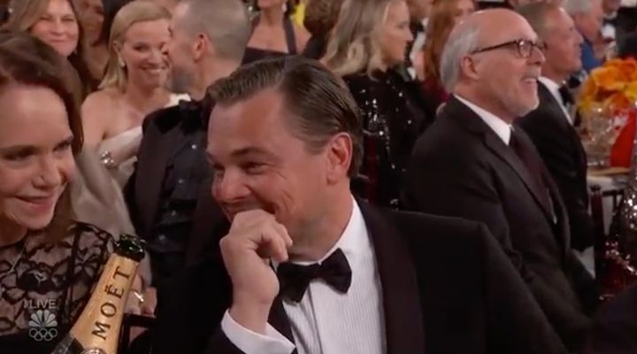 Leonardo DiCaprio, looking a lot like someone who wants the ground to swallow them whole