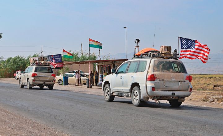 A US military convoy arrives near Dahuk, Iraq.