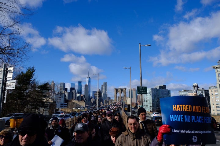 Demonstrators crossed the Brooklyn Bridge as they made their way to Cadman Plaza, where community leaders spoke against anti-Semitism.