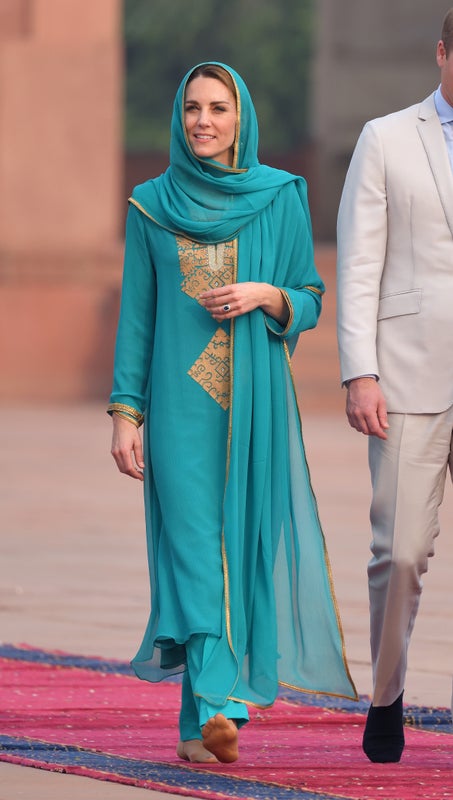 In traditional Pakistani dress while in Islamabad during a royal tour of Pakistan.