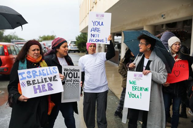 Activists take part in a demonstration outside the Famagusta courthouse in Paralimni, Cyprus on Tuesday