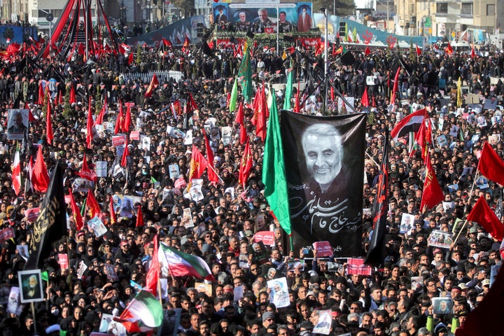Mourners attend a funeral ceremony for Iranian Gen. Qassem Soleimani and his comrades, who were killed in Iraq in a U.S. dron
