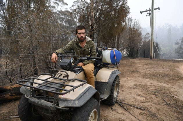 Local Aboriginal man Anthony Thomas is seen at his uncle's property destroyed by bushfires in Kiah, Australia January 8, 2020.