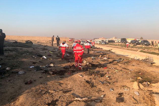 Debris is seen from the plane crash on the outskirts of Tehran, Iran, Wednesday, Jan. 8, 2019.