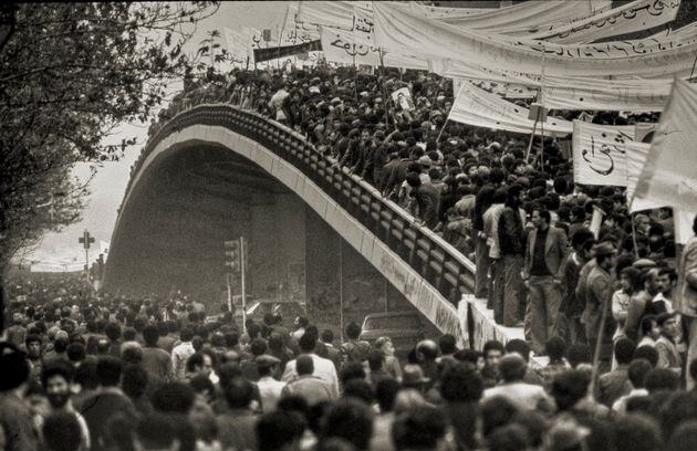 Crowds gather in Tehran for the return of Ayatollah Khomeini.