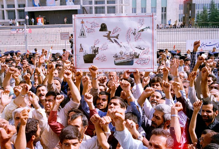 <strong>Thousands of Iranians chanting "Death to America" participate in a mass funeral for 76 people killed when the USS Vincennes shot down Iran Air Flight 655, in Tehran, Iran, July 7, 1988.</strong>