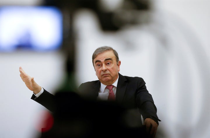 Former Nissan chairman Carlos Ghosn gestures during a news conference at the Lebanese Press Syndicate in Beirut, Lebanon January 8, 2020. REUTERS/Mohamed Azakir