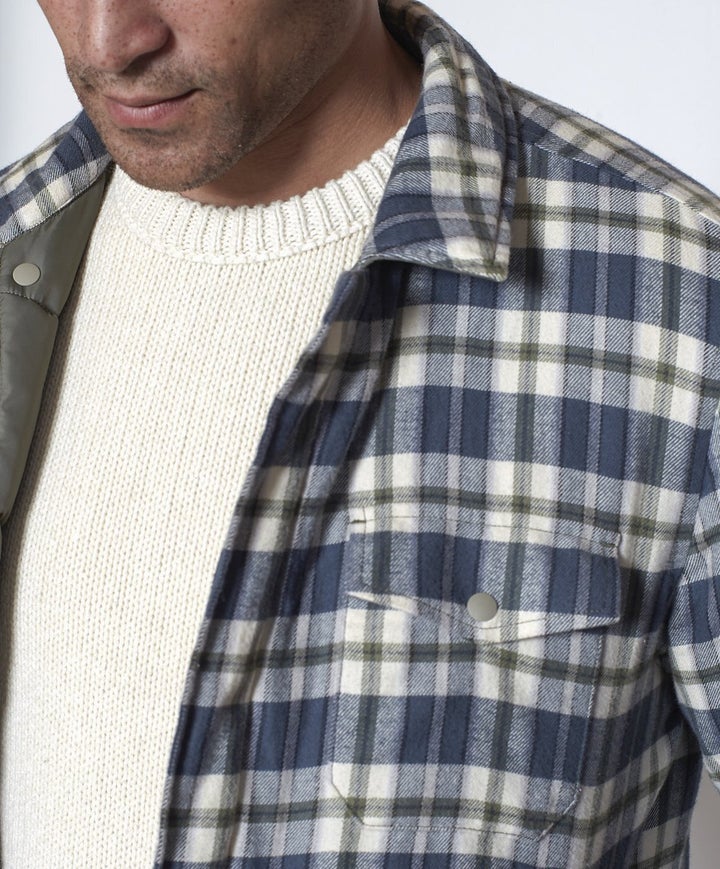 This <a href="https://fave.co/35DMAzw" target="_blank" rel="noopener noreferrer">reversible puffer</a> boasts organic cotton on the inside and a fill that's made entirely from recycled polyester. Even the nylon side is made from regenerated fishing nets and other nylon waste. 
