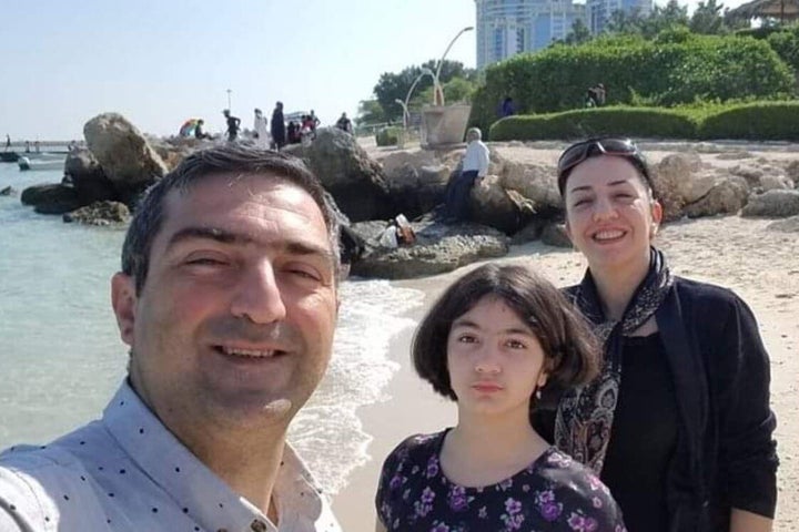 Mohammad Sadeghi (left), his wife, Bahareh Hajesfandiari, and their daughter, Anisa Sadeghi are shown in a handout photo from Facebook. 