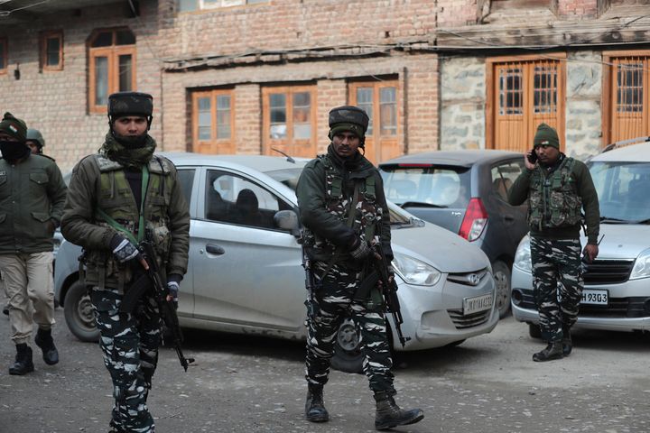 Paramilitary soldiers patrol near the site of an explosion in Srinagar, Kashmir, Saturday, Jan. 4, 2020. 