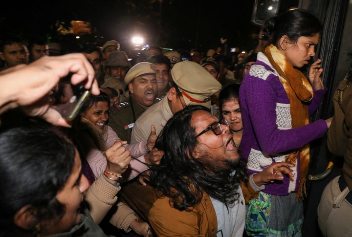 Police detain protesters during a march against the Jawaharlal Nehru University (JNU) violence, in New Delhi, January 9, 2020. 