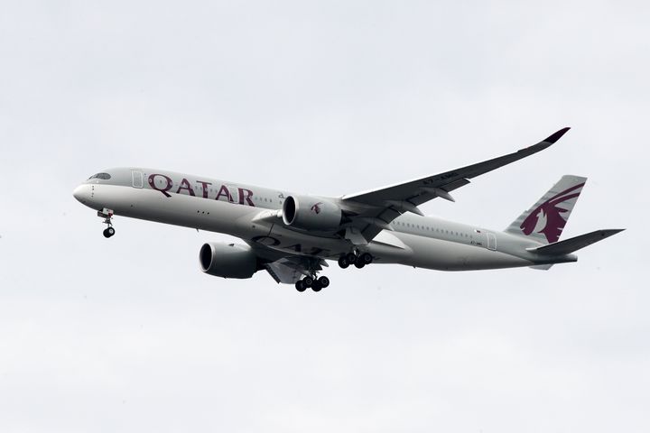 A Qatar Airways jet approaches Philadelphia International Airport in Philadelphia, Thursday, Nov. 7, 2019. (AP Photo/Matt Rourke)