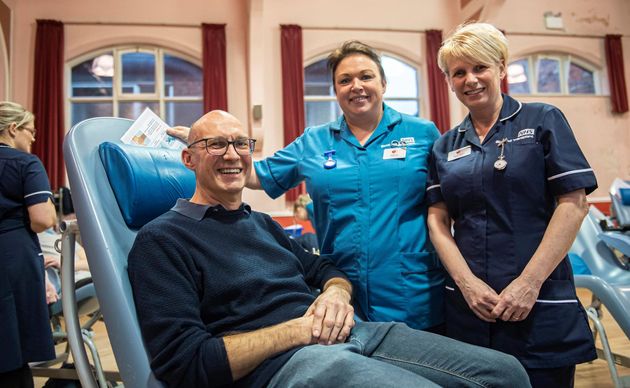 Bob Downes with donor carer Rebecca Morton and senior sister Susan Baker